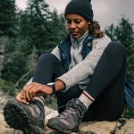 woman tying her shoelaces