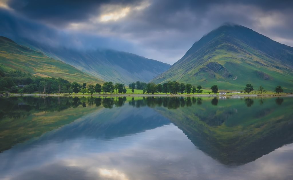 Buttermere lake with Fleetwith Pike reflected in the water in the Lake District