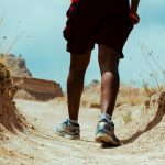a person walking opersonn the ground soil