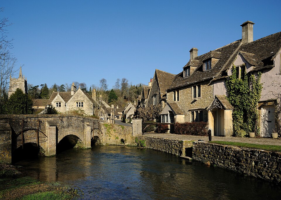 Historic stone cottages beside the river at Castle Combe